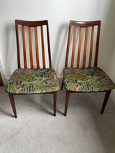 Load and play video in Gallery viewer, Pair of Mid century vintage G Plan dinning room chairs - reupholstered in Ruskin Velvet
