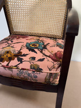 Load and play video in Gallery viewer, Vintage woven cane tub chair with beautifully reupholstered seat in a Designer velvet
